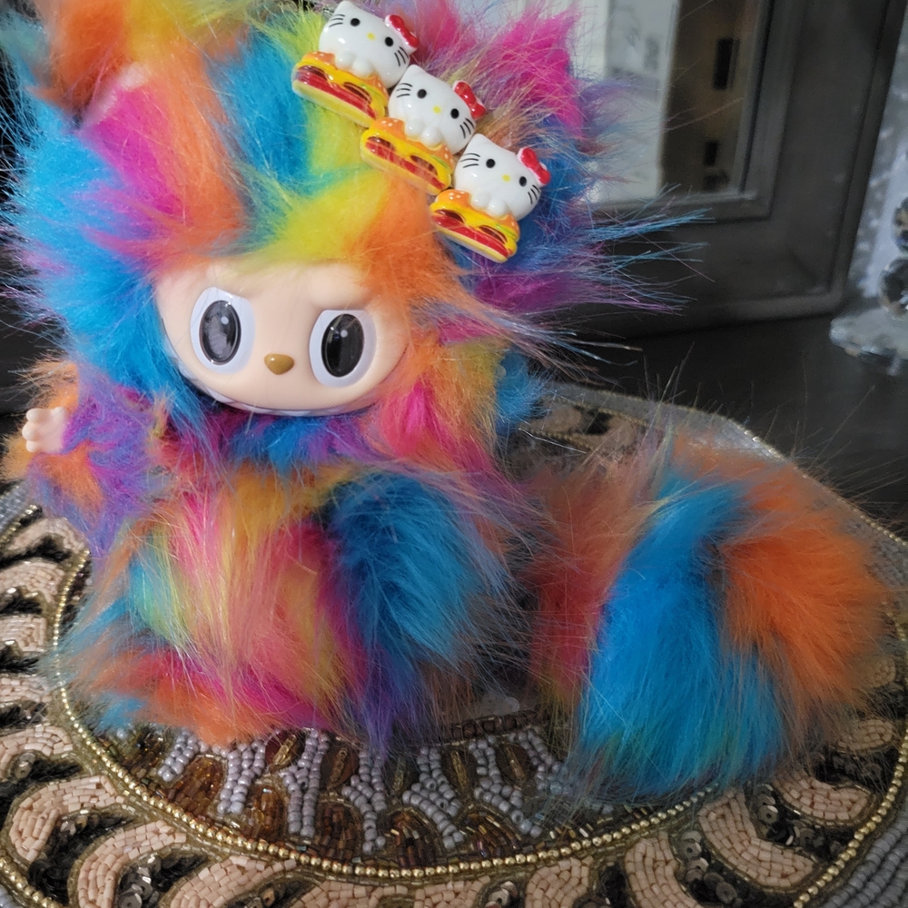 Colorful Furry Toy with Hello Kitty Accents
